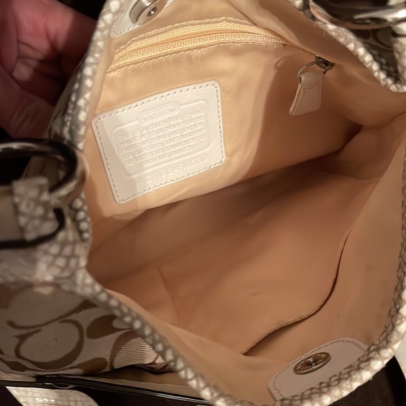 Coach bag. Beautiful condition. Minimal ink stain inside. Will ship immediately. - Picture 7 of 12